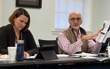 MNJ photo/Rachel Hoskins - Allison Edge, SEARCH Adminstrative Assistant listens as Board Chair Dr. Tom Kaluzynski talks about the findings of the community needs assessment.