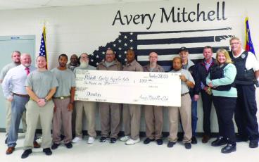 Photo submitted - Inmates from Avery/Mitchell Correctional Institution donated $1,000 to Toys for Tots.