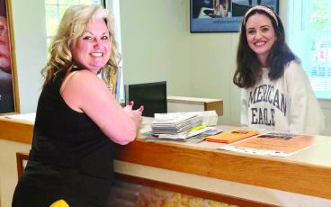 MNJ photo/Sarah Quintas. Chamber of Commerce employees Laurel Self (right) and Jill Edwards (left) are ready to greet visitors at the Mitchell County Visitor Center.